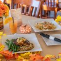 Fall themed table at ropewalk with entrees on it