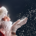 santa blowing snow from his hands